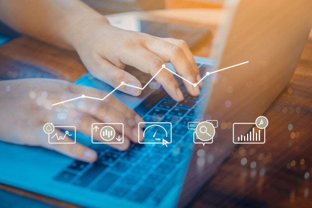 Person,Using,A,Laptop,Computer,With,Digital,Marketing,Technology,Concept.