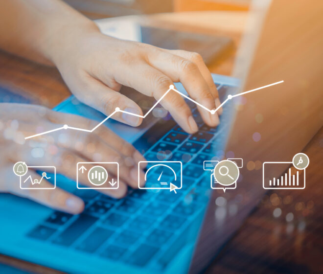 Person,Using,A,Laptop,Computer,With,Digital,Marketing,Technology,Concept.