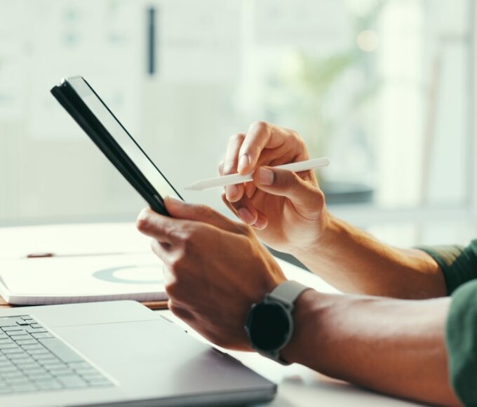 Person,,Hands,And,Writing,In,Office,With,Tablet,,Laptop,And